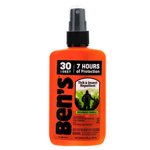 An orange spray bottle of insect repellent on a white background