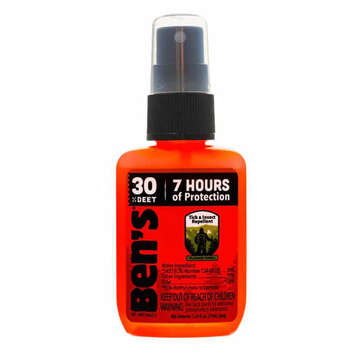 An orange spray bottle of insect repellent on a white background