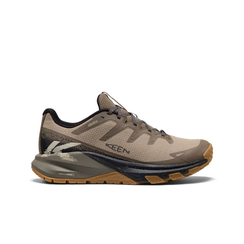 keen Targhee Apex in dusty light brown with darker brown ascents with a black and green sole with brown tread.