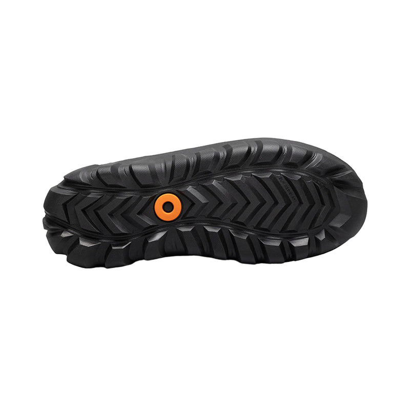 Black shoe sole with orange circular logo on a white background