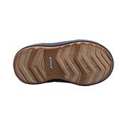 Close-up of a shoe sole with a brand logo on a white background