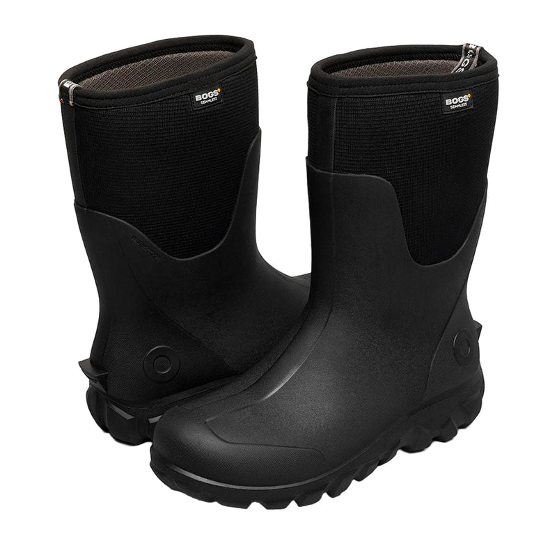 Pair of black rubber boots on a white background