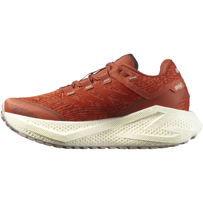 Orange and white running sneaker on a white background
