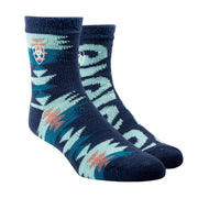 Pair of blue socks with a pattern on a beige background