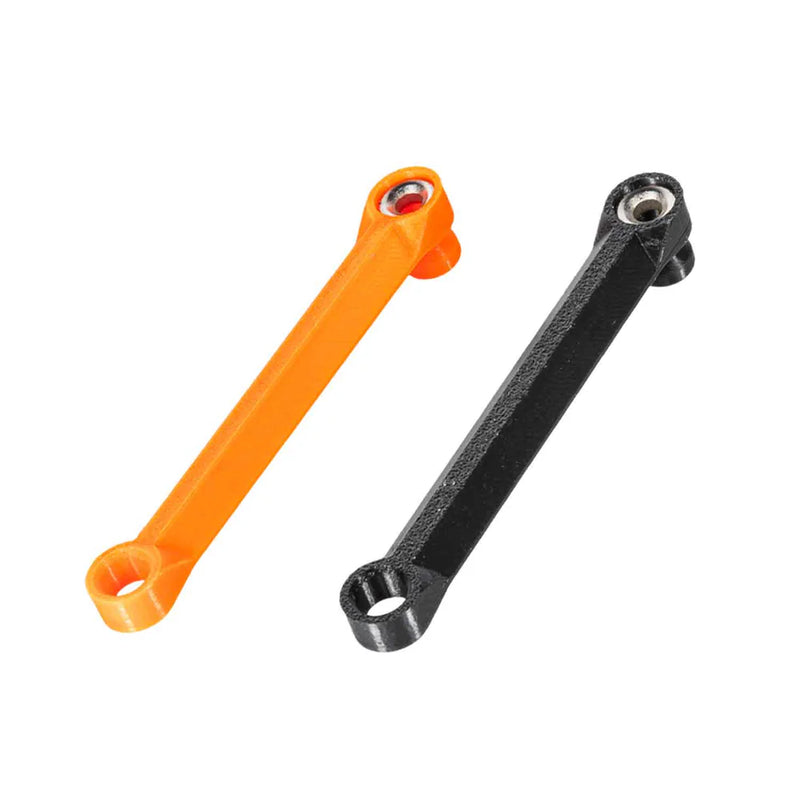 Orange and black metal shafts on a white background