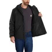 Man wearing a black jacket over a gray shirt on a white background