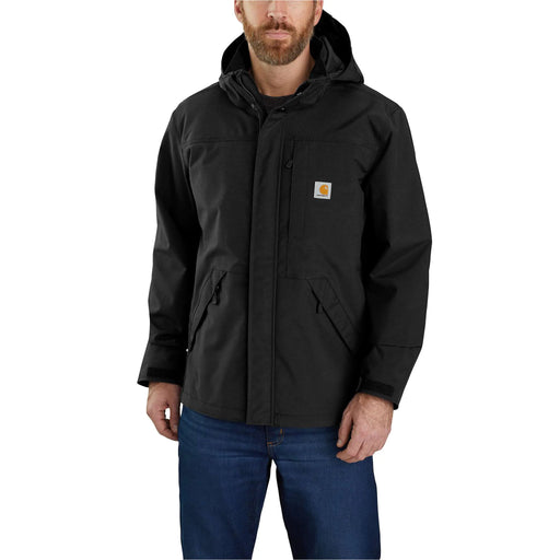 Man wearing a black Carhartt jacket on a white background