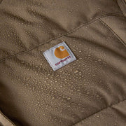 Very close-up image of a tarmac brown parka wicking water with a Carhartt logo in the center.