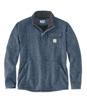 Faded navy colored fleece quarter zip jacket against a white background. The jacket has a chest pocket with a Carhartt logo on it, as well as a zippered pouch pocket towards the bottom. It also has grey colored fur lining the collar.