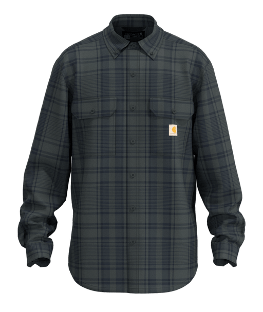 A long-sleeve button-up shirt with a dark gray and black plaid pattern, featuring two chest pockets and a small orange Carhartt logo patch on the left chest, set against a solid green background.