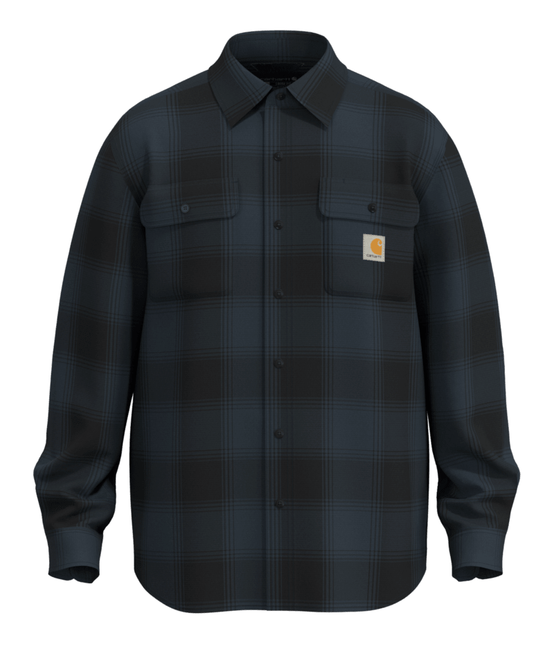 A dark navy and black plaid button-up shirt jacket by Carhartt, featuring two chest flap pockets and the signature Carhartt logo patch on the left chest, set against a solid green background.