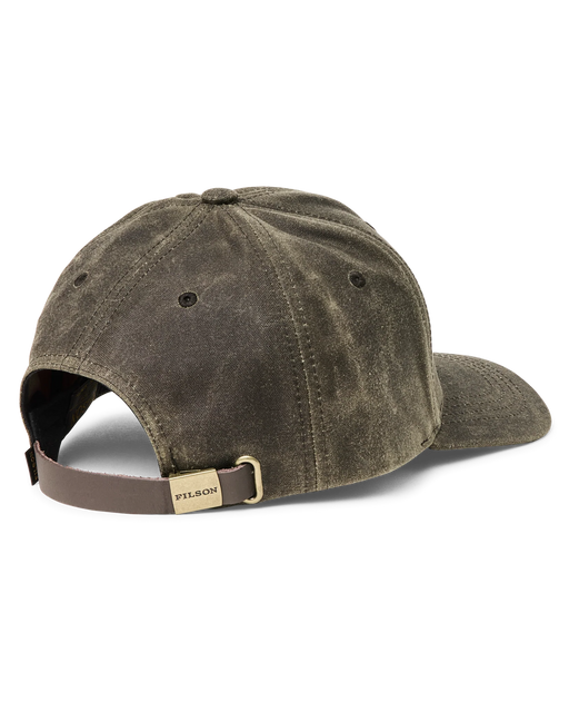 Back view of a dark green baseball cap featuring a Filson logo against a white background. 