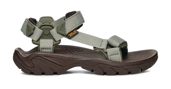 Side view of a dark brown sandal with green straps on a white background.