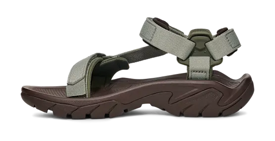 Side view of a dark brown sandal with green straps on a white background.