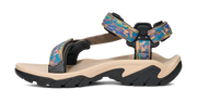 Side view of a tan sandal with colorful straps on a white background.