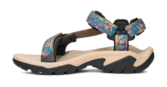 Side view of a tan sandal with colorful straps on a white background.