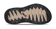 Close-up of a shoe sole with 'Teva' branding on a white background