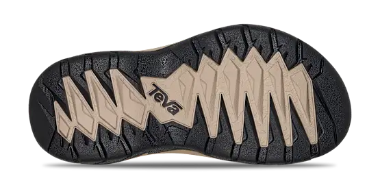 Close-up of a shoe sole with 'Teva' branding on a white background