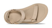 Beige sandal with straps on a white background.