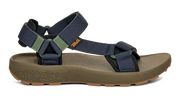 Side view of a dark green sandal with blue straps on a white background.