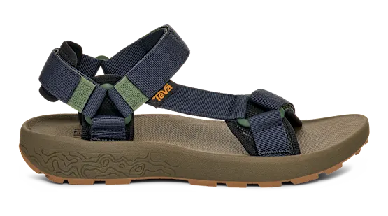 Side view of a dark green sandal with blue straps on a white background.