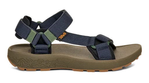 Side view of a dark green sandal with blue straps on a white background.