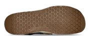Bottom tread of a sandal on a white background.