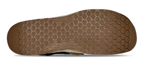 Bottom tread of a sandal on a white background.