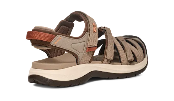 Side view of a brown sandal with orange and white accents on a white background.