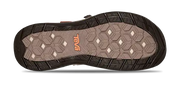 Close-up of a sandal sole with brand logo on a white background