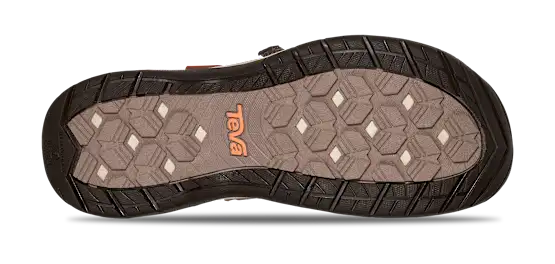 Close-up of a sandal sole with brand logo on a white background