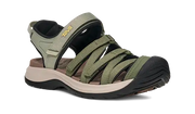 Side view of a green and white sandal on a white background.
