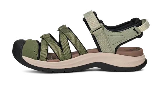 Side view of a green and white sandal on a white background.