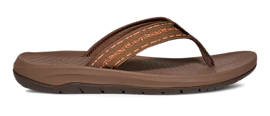 Side view of a brown flip flop on a white background.