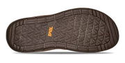 Bottom tread of a shoe with a Teva logo on a white background.