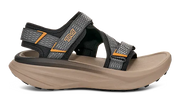 Side view of a tan sandal with grey and black straps on a white background.