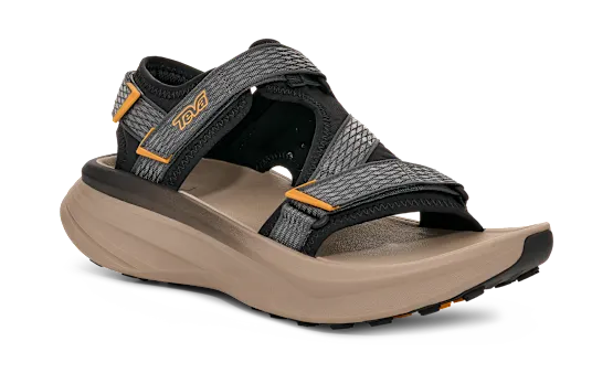 Tan sandal with grey and black straps on a white background.