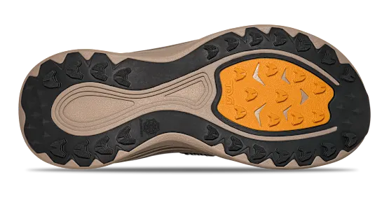 Close-up of a shoe sole with orange tread pattern on a white background