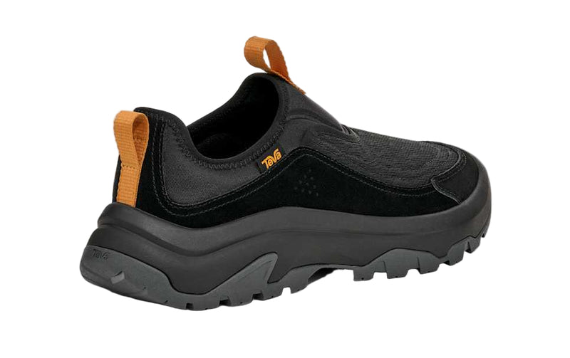 Black slip-on shoe with orange accents on a white background