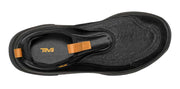 Black slip-on shoe with orange Teva logo on a white background
