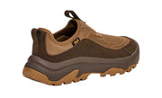 Brown and tan hiking shoe on a light gray background