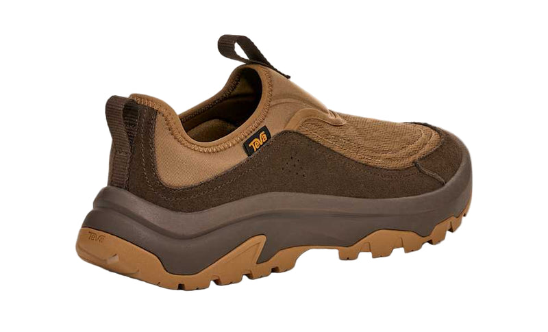 Brown and tan hiking shoe on a light gray background