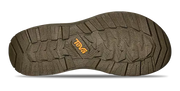 Close-up of a brown shoe sole with 'Teva' logo on a white background