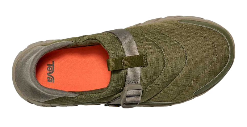 Green sneaker with orange sole on a white background