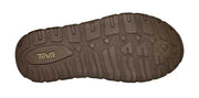 Brown sole of a Teva shoe with tread pattern on a white background