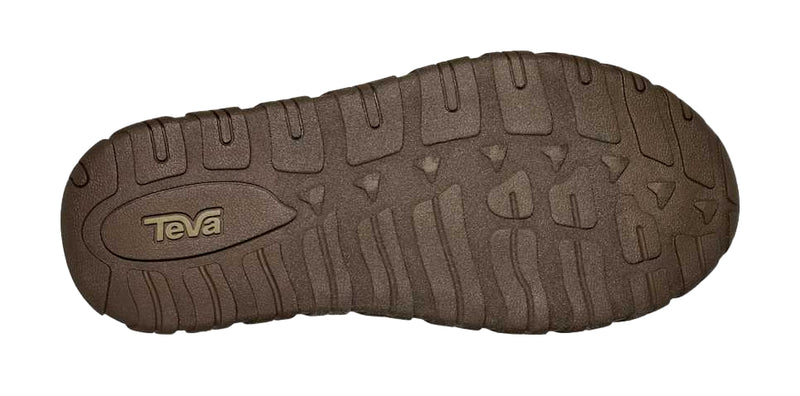 Brown sole of a Teva shoe with tread pattern on a white background