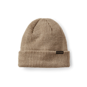 Sawdust brown colored beanie with a tan Filson logo on it against a white background. 