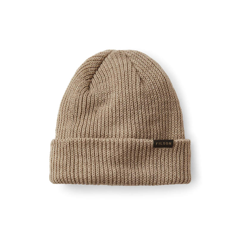Sawdust brown colored beanie with a tan Filson logo on it against a white background. 