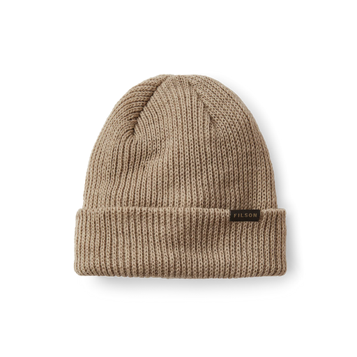 Sawdust brown colored beanie with a tan Filson logo on it against a white background. 