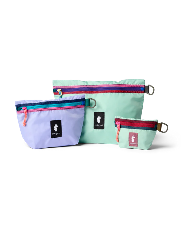 A small teal, medium purple, and large teal pouches